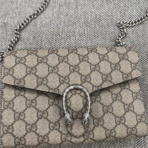 Gucci Dionysus bag. Gg supreme canvas comes with chain. Beige color